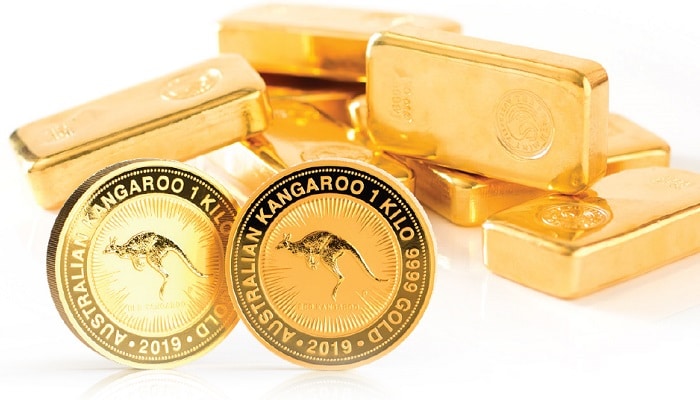 Monedas de oro y lingotes de oro