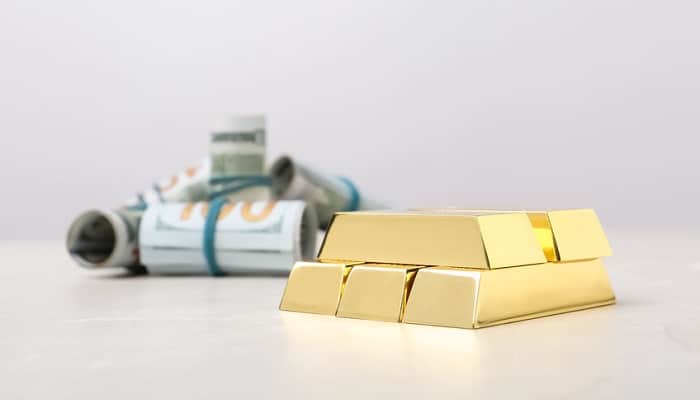 Lingotes de oro frente a dolar